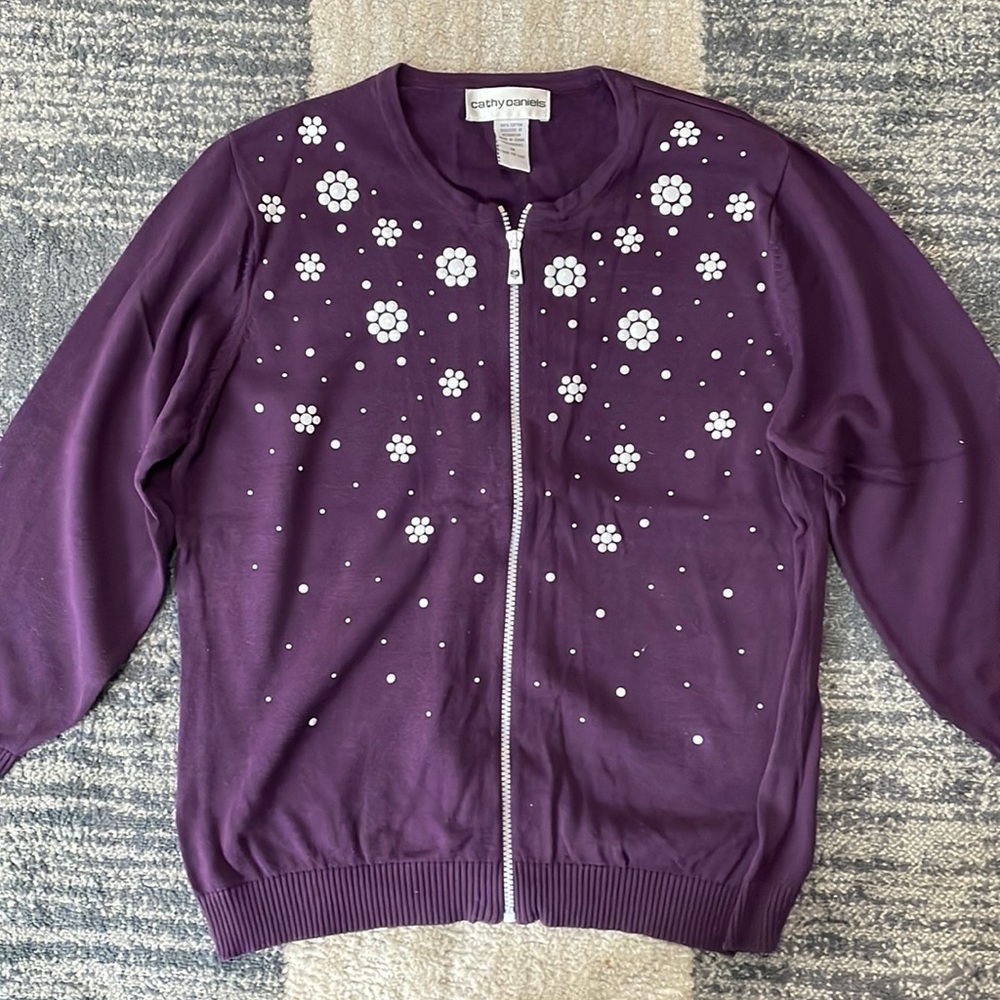 Cathy Daniels purple sweater with white flowers